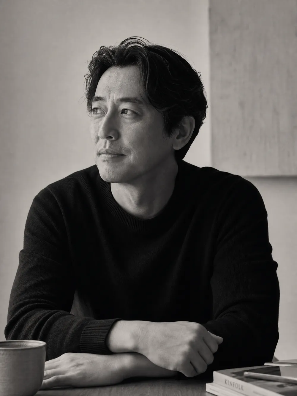 A composed man at home in warm morning light